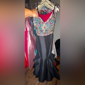 Black mermaid with unique multi color stone design.